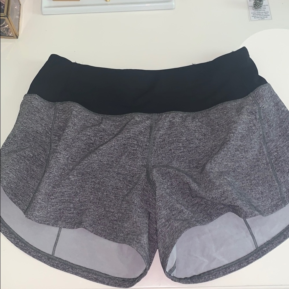 NEVER WORN w/o tags 4” speed up shorts
